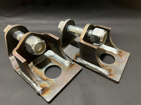 Rear lower shock mounts for Nissan Patrol GQ GU showing raised heavy duty design