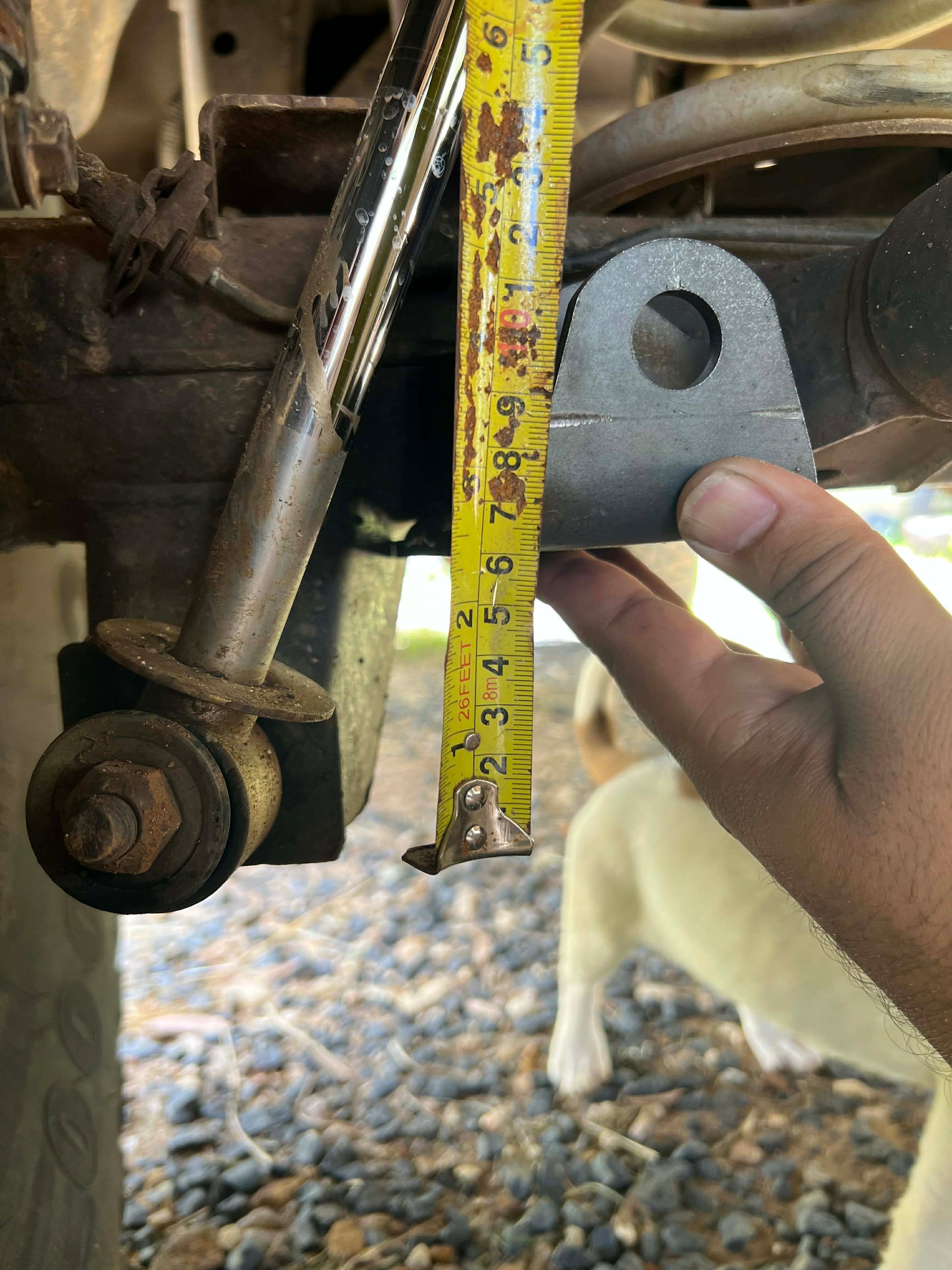 Raised rear shock mounts installed on Nissan Patrol GQ showing improved ground clearance