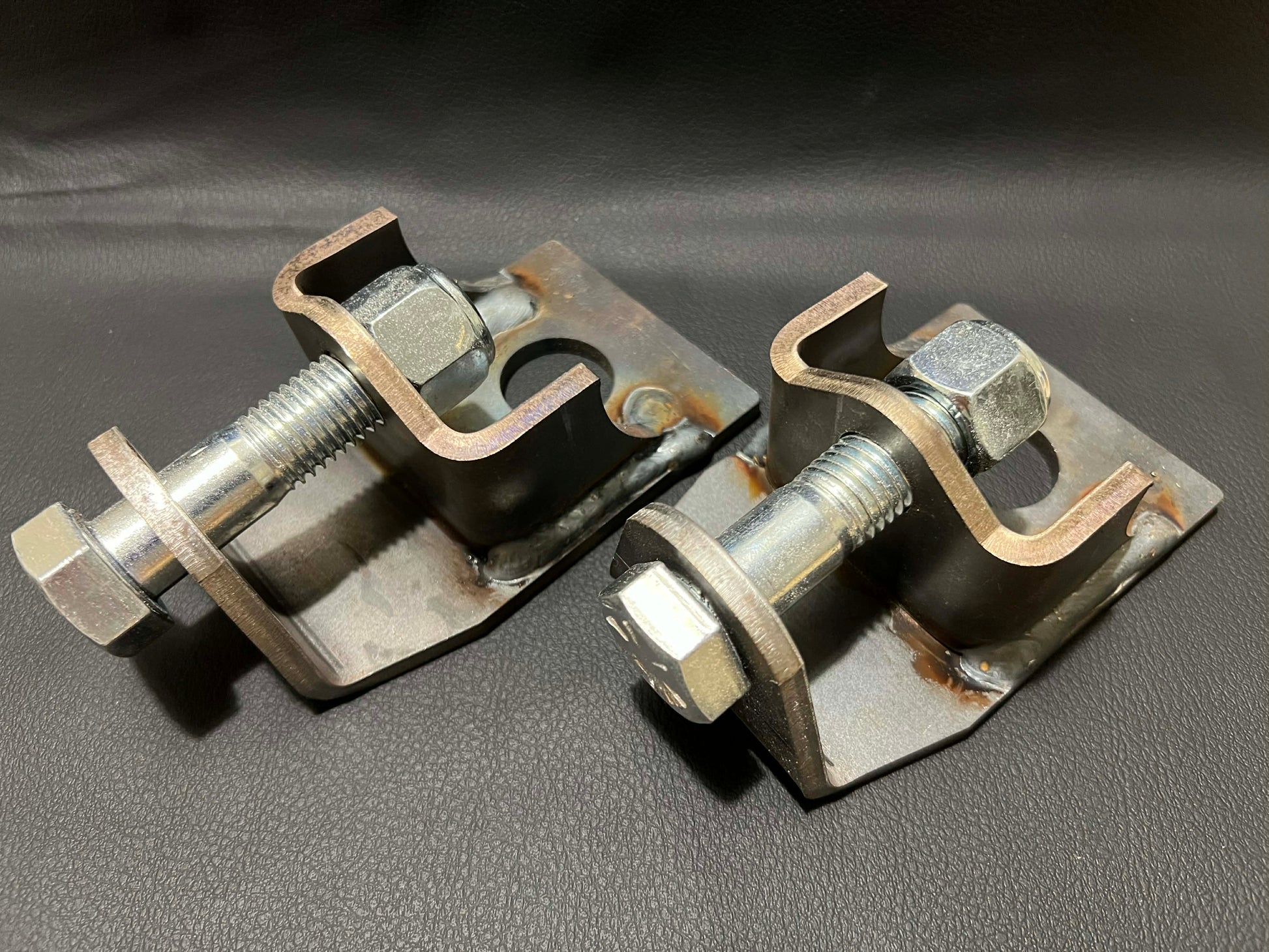 Nissan Patrol rear suspension flex showing improved articulation with raised shock mounts